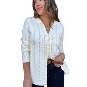 NEW COZY CO. cableknit lace up sweater in cream